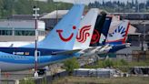 Boeing's financial woes continue, while families of crash victims urge US to prosecute the company