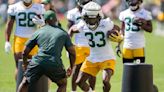 Aaron Jones returns to practice, Christian Watson practices fully again