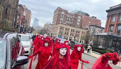 For these older MetroWest activists, climate change requires more than petitions, letters