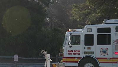 Firefighters continue to work to oust brush fire in Boca Raton