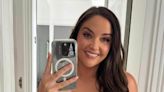 Jacqueline Jossa displays her amazing figure in a plunging swimsuit