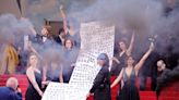 Cannes Report Day 6: ‘Holy Spider’ Red Carpet Begins With Smoke Bomb Demonstration Against Domestic Violence