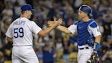 Dodgers relievers playing games in the bullpen, saving games on the mound