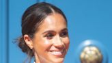 Meghan Markle said her dad once made her a custom Barbie doll family with a Black mom and white dad to help her celebrate being biracial