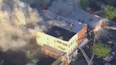 FDNY battling 5-alarm supermarket fire that spread to multiple buildings in Brooklyn