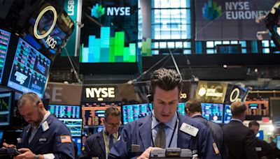 Stock market today: US stocks climb on solid earnings and rate cut hopes