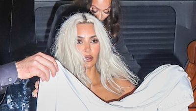 Kim Kardashian hides under sheet as she leaves Met Gala after backlash