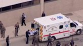 Carjacking suspect guns down three police officers in Chicago police station shoot out