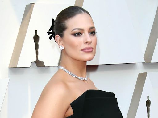 Ashley Graham Takes Vogue World in Paris in Deep Blue Gown With Full Feathered Skirt