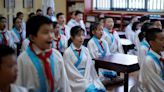 China launches campaign to halt school bullying, excessive homework