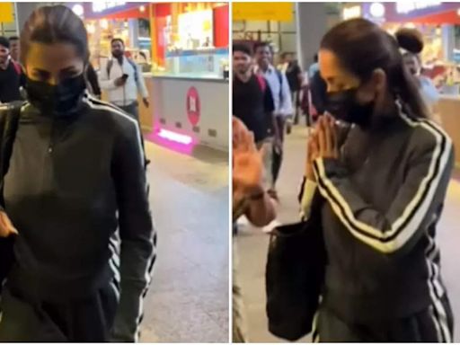 Malaika Arora wins hearts with a heartwarming gesture to an old woman at the airport | Hindi Movie News - Times of India
