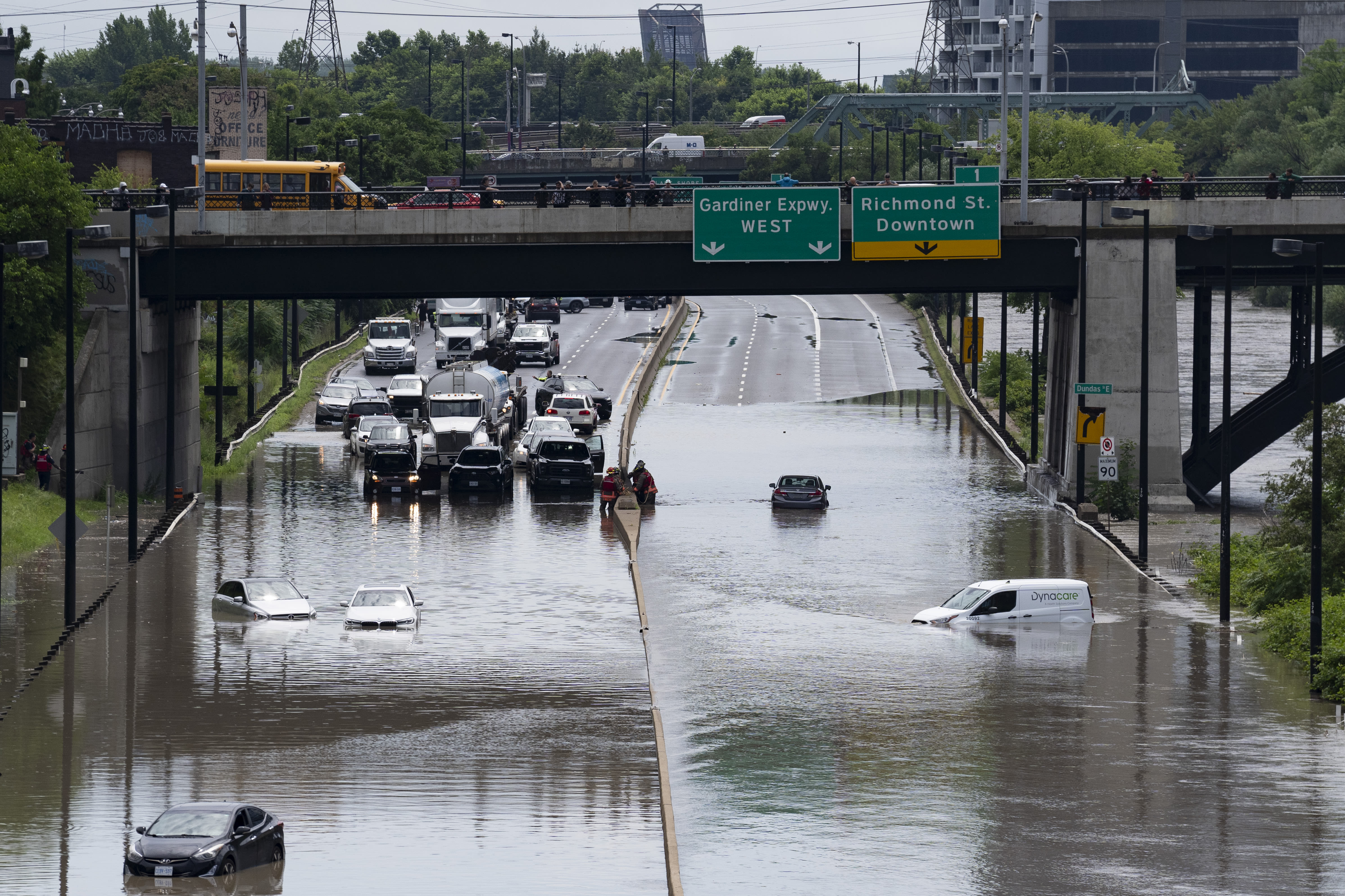 An 'indoor waterfall' at Union Station: Downtown Toronto flooded as severe storm disrupts life in the region