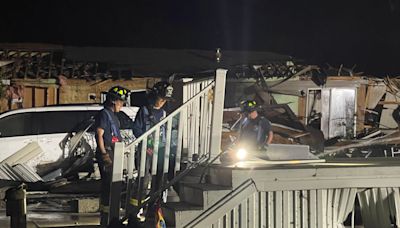 After tornadoes tear through west Michigan, emergency workers search through wreckage