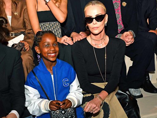 Charlize Theron Enjoys Rare Outing with Daughter August, 7, as They Sit Front Row at Dior Pre-Fall Show