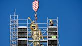 Angel Moroni statue returns to the top of the Salt Lake Temple