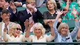 Queen Camilla visits Wimbledon and joins fans in doing 'the wave'