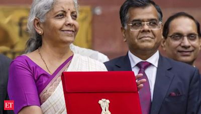 Nirmala Sitharaman dons elegant white and magenta saree for historic 7th Budget - Nirmala Sitharaman presents Budget