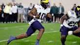 Michigan's QB battle among many in Big Ten