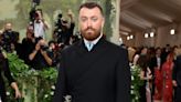 A fan caught Sam Smith wearing $2,450 jeans that were entirely ripped across the back for a recent flight