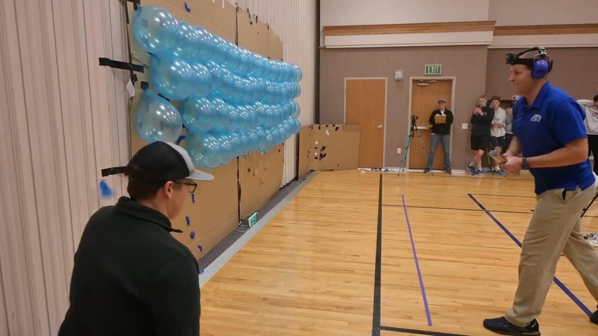 Watch: Idaho man throws chopsticks at balloons for his 180th world record