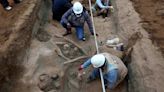 Workers uncover eight mummies and pre-Inca objects while expanding the gas network in Peru