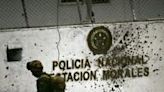 Two police officers and two detainees were killed in an attack by EMC militants with guns and cylinder bombs on a police station in Morales, Colombia