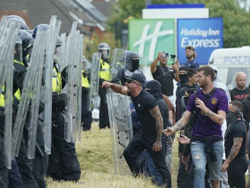 Cabinet minister promises ‘reckoning’ after disorder outside hotel in Rotherham