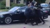 Moment Slovakia Prime Minister Robert Fico bundled into his car after being shot