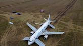 Russian airline aims for patched up Airbus to take off from field where it landed