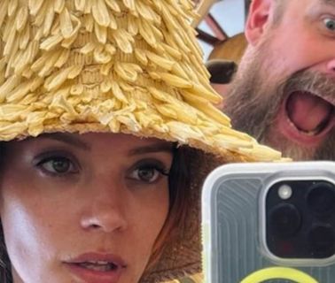 Lily Allen tries on hats with husband David Harbour in Italy