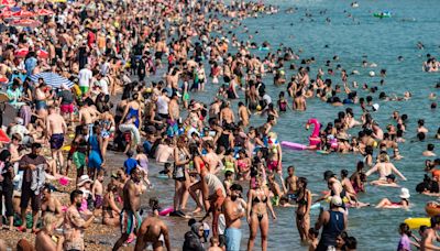 Families enjoy day out at jam-packed beaches on hottest day of 2024