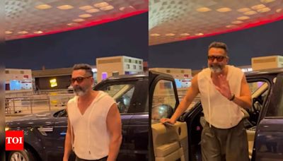 Bobby Deol turns heads with a stylish airport look and warm gestures toward fans | Hindi Movie News - Times of India