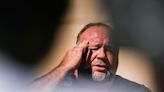 Alex Jones is transferring his money away so he doesn't have to pay Sandy Hook victims, NYT reports