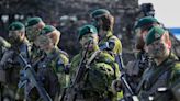 Sweden should spend more on defense and increase the number of conscripts, lawmakers recommend