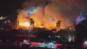 Raging blaze destroys mill building near Massachusetts-Rhode Island line