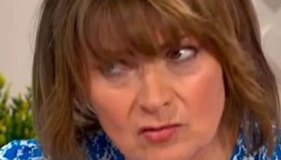 Lorraine Kelly's co-star reacts as she races into sea in plunging swimsuit
