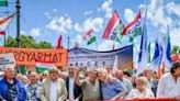 Supporters of Hungary's ruling FIDESZ and the KDNP Christian democrats marched in Budapest, calling for peace in Ukraine