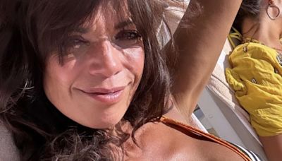 Jenny Powell, 56, looks like she’s ageing backwards in low cut bikini on holiday