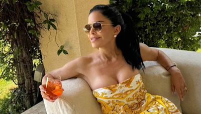 Lauren Sanchez, 54, flaunts her cleavage in a low-cut designer dress