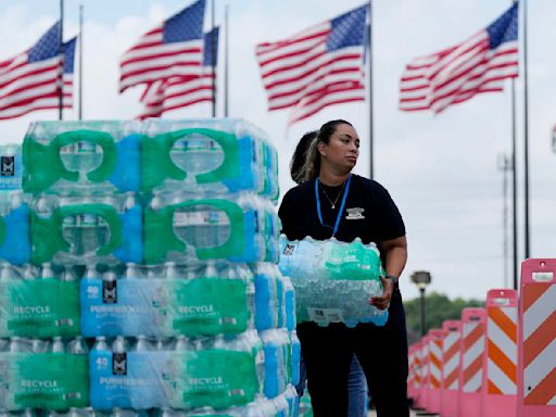 Race to restore power to 1.3M after Hurricane Beryl as dangerous heat wave continues