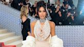 Kim Kardashian “Dripping in Pearls” at Met Gala in Custom Schiaparelli Nude Dress