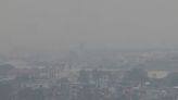 Phillippines urges residents to mask up as volcanic smog blankets capital