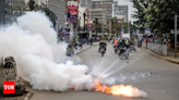 Kenya police fire tear gas as anti-government protesters burn tyres - Times of India