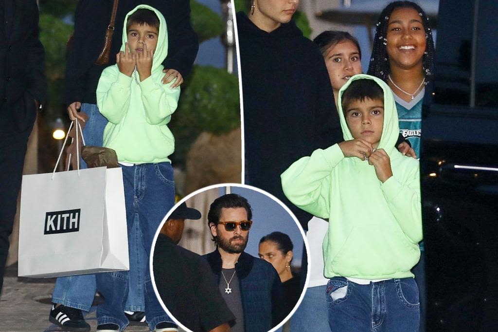 Reign Disick, 9, flips off the paparazzi outside of Nobu with dad Scott, sister Penelope and North West