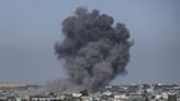 The Latest | 12 killed in airstrikes in central Gaza as strikes targeting Houthi rebels kill 16