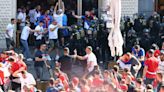 Riot cops clash with fans in violent scenes before Serbia & Denmark's 0-0 draw