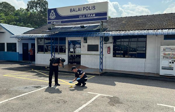 Man kills 2 officers at police station in Malaysia in a suspected Jemaah Islamiyah attack