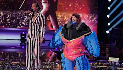 ...Literally Took Eight Guys To Pick Me Up’: The Masked Singer’s Kate Flannery Reflects On Falling While In The...