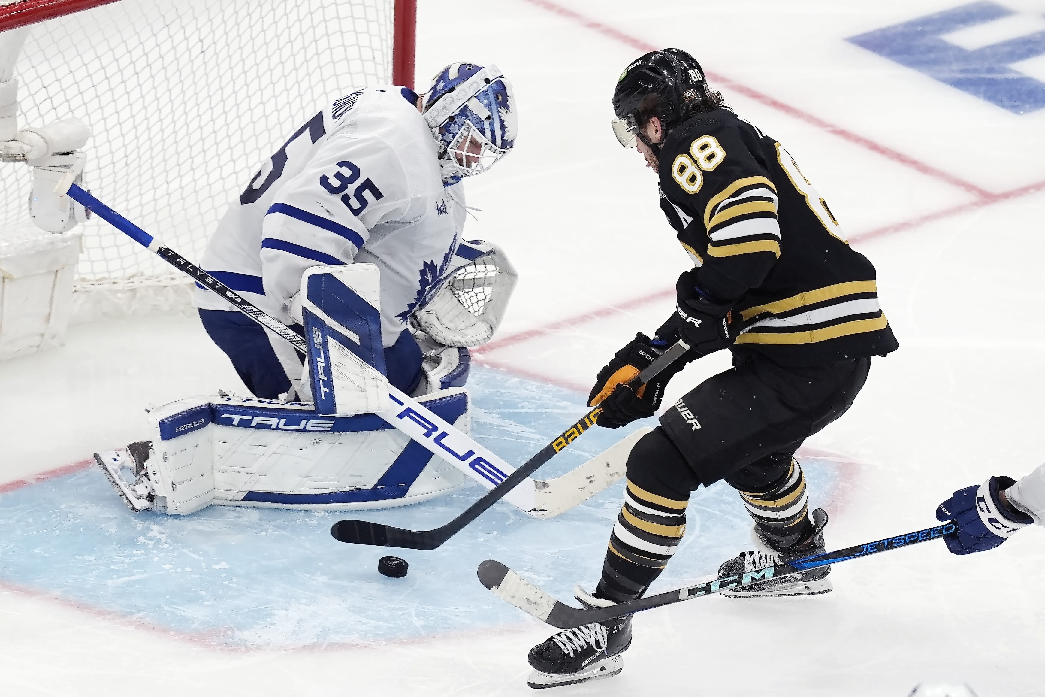 David Pastrnak scores in overtime to lift Bruins to Game 7 win over rival Maple Leafs