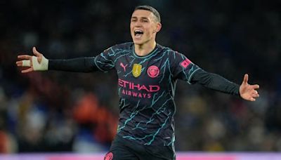 Man City beats Brighton 4-0 to stay on course for another Premier League title. Phil Foden scores 2